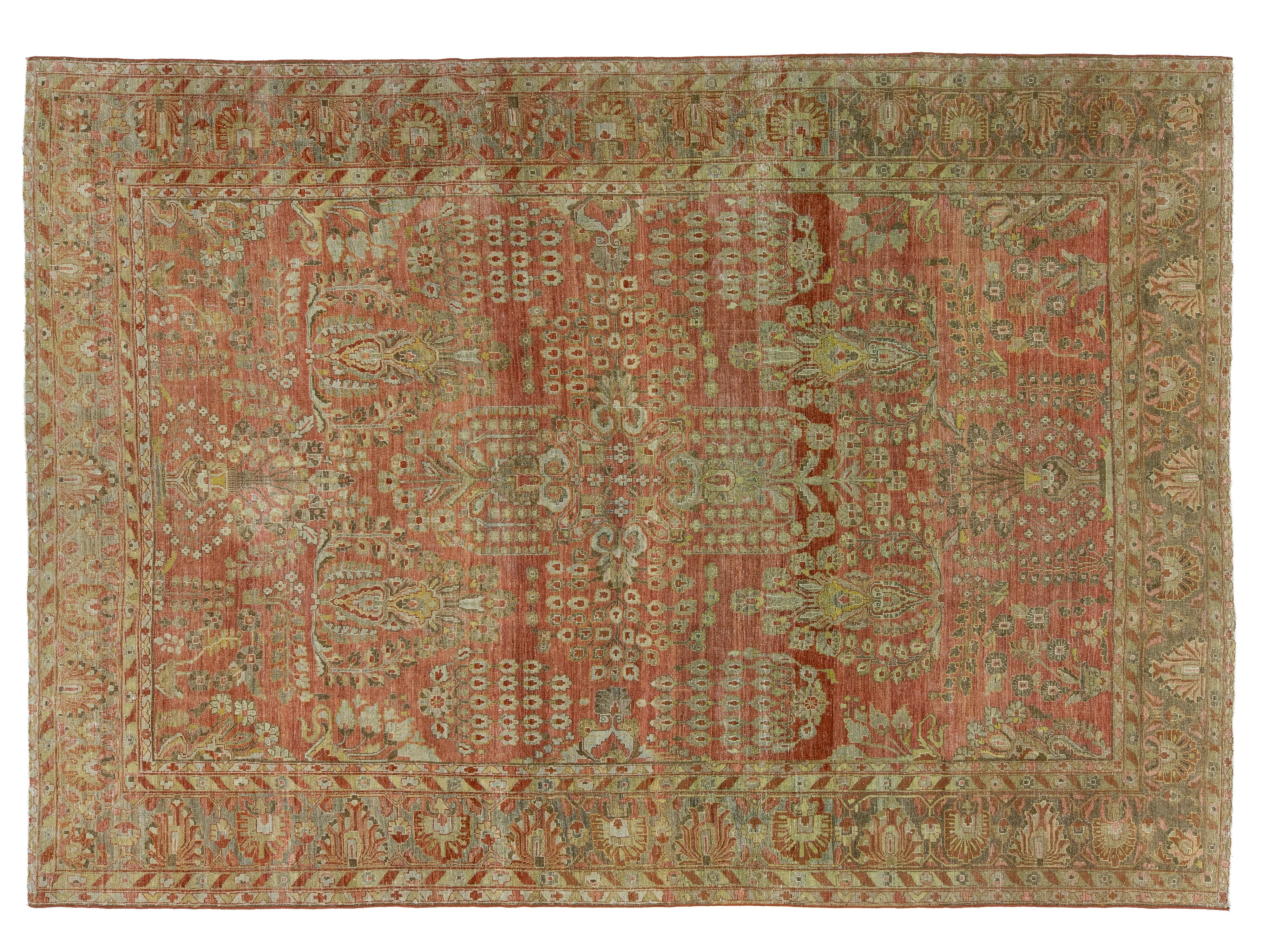 A rectangular malayer-style area rug with an intricate floral and medallion pattern in muted terracotta red, beige, and olive green tones.