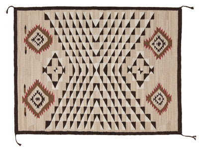 A rectangular woven rug with a geometric Southwestern pattern in beige, black, brown, and muted red, shown flat against a white background.