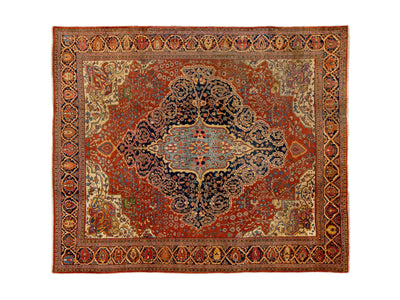 A traditional Persian Sarouk-style area rug with a complex floral and geometric pattern, featuring a central medallion in shades of red, blue, beige, and brown.