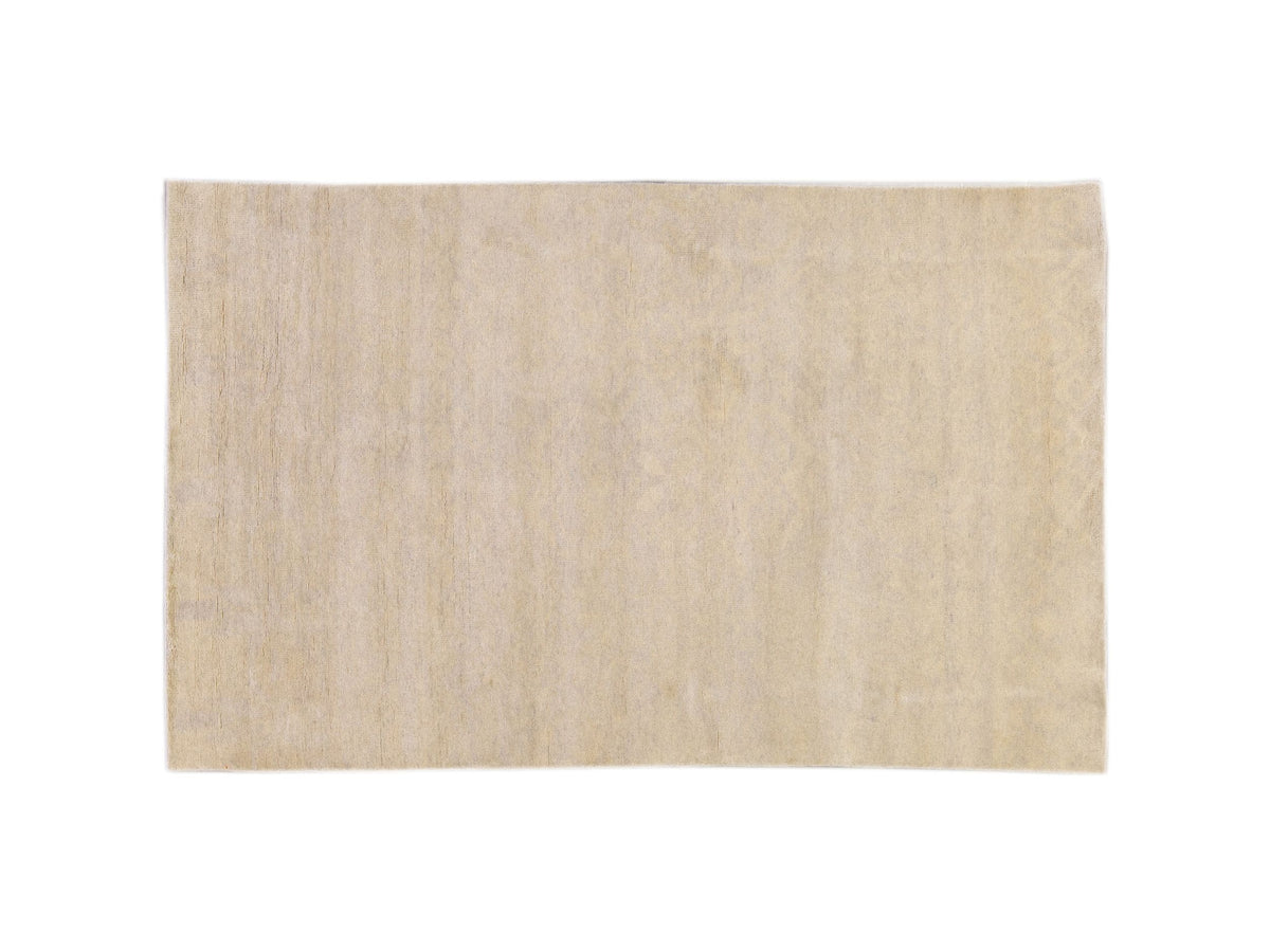 A rectangular area rug in a light beige or cream color with a subtle, soft vertical textured pattern, shown flat against a white background.
