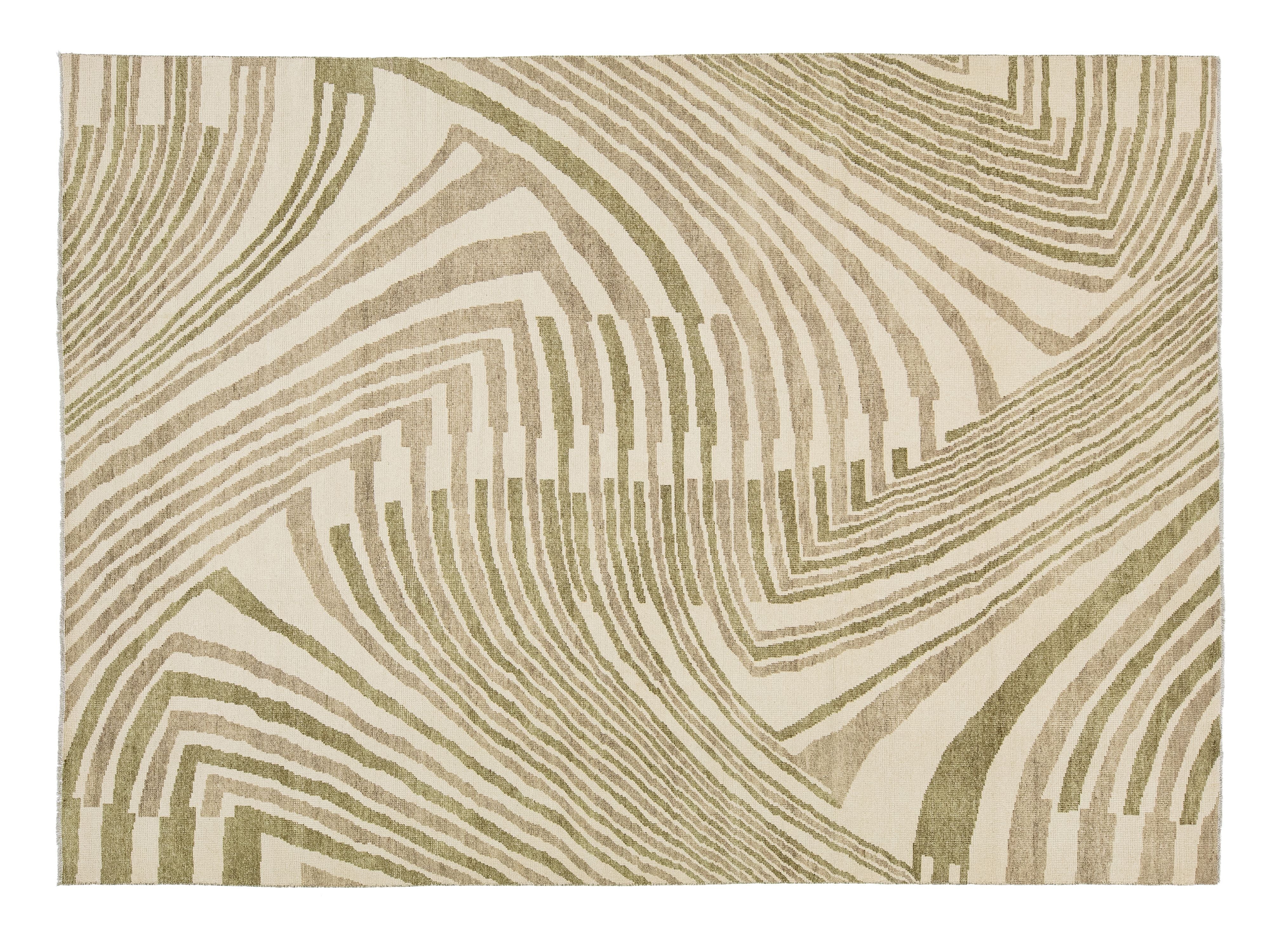 A square area rug featuring an abstract, organic wavy pattern in muted sage green and beige tones.