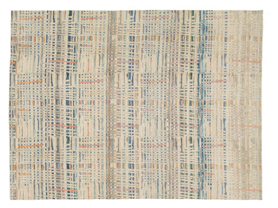 A rectangular area rug with an abstract, textured basketweave pattern in cream, beige, light blue, and muted orange.