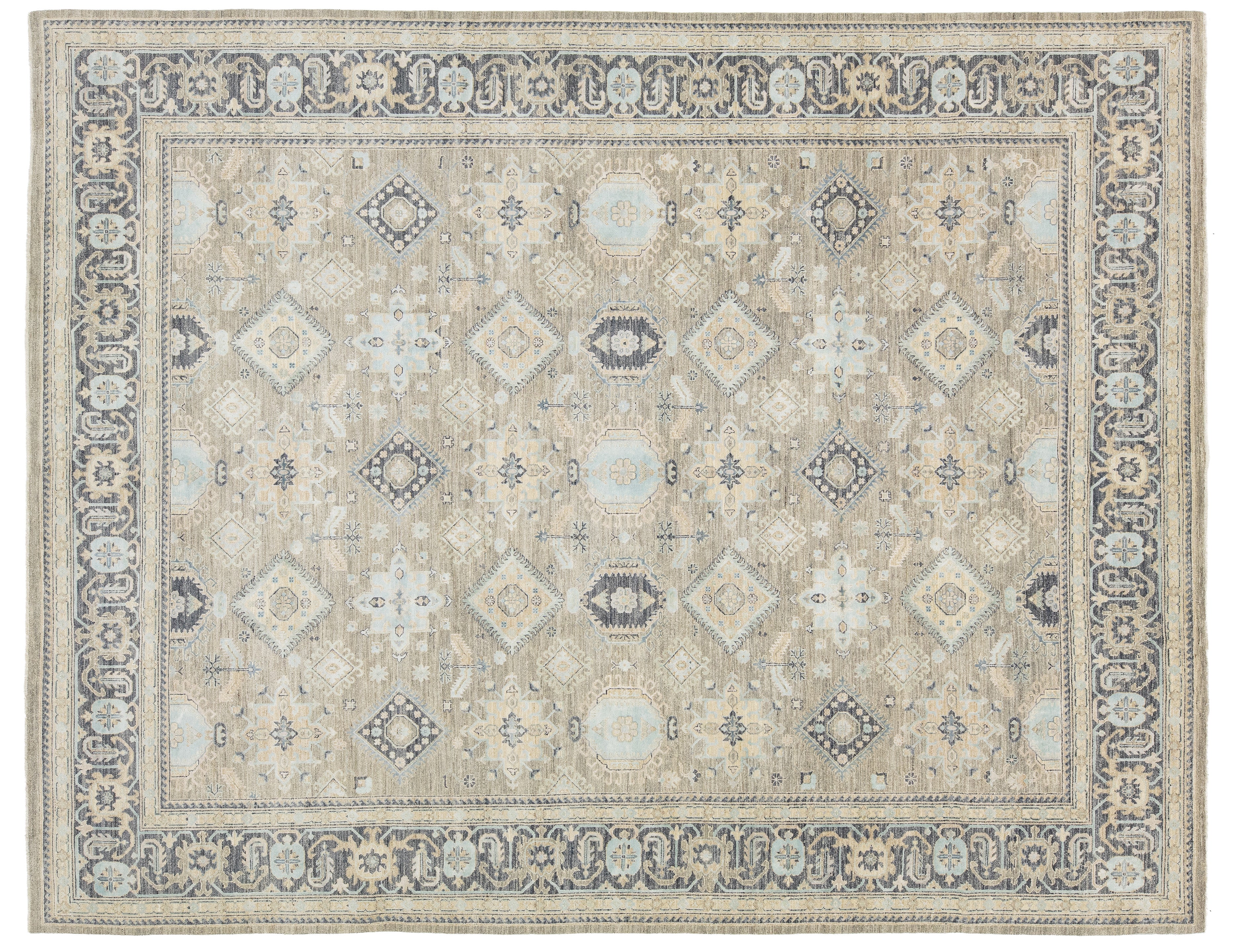 A traditional oriental-style area rug with a beige base, featuring a detailed border and central medallion pattern in muted blue, gray, and cream tones.