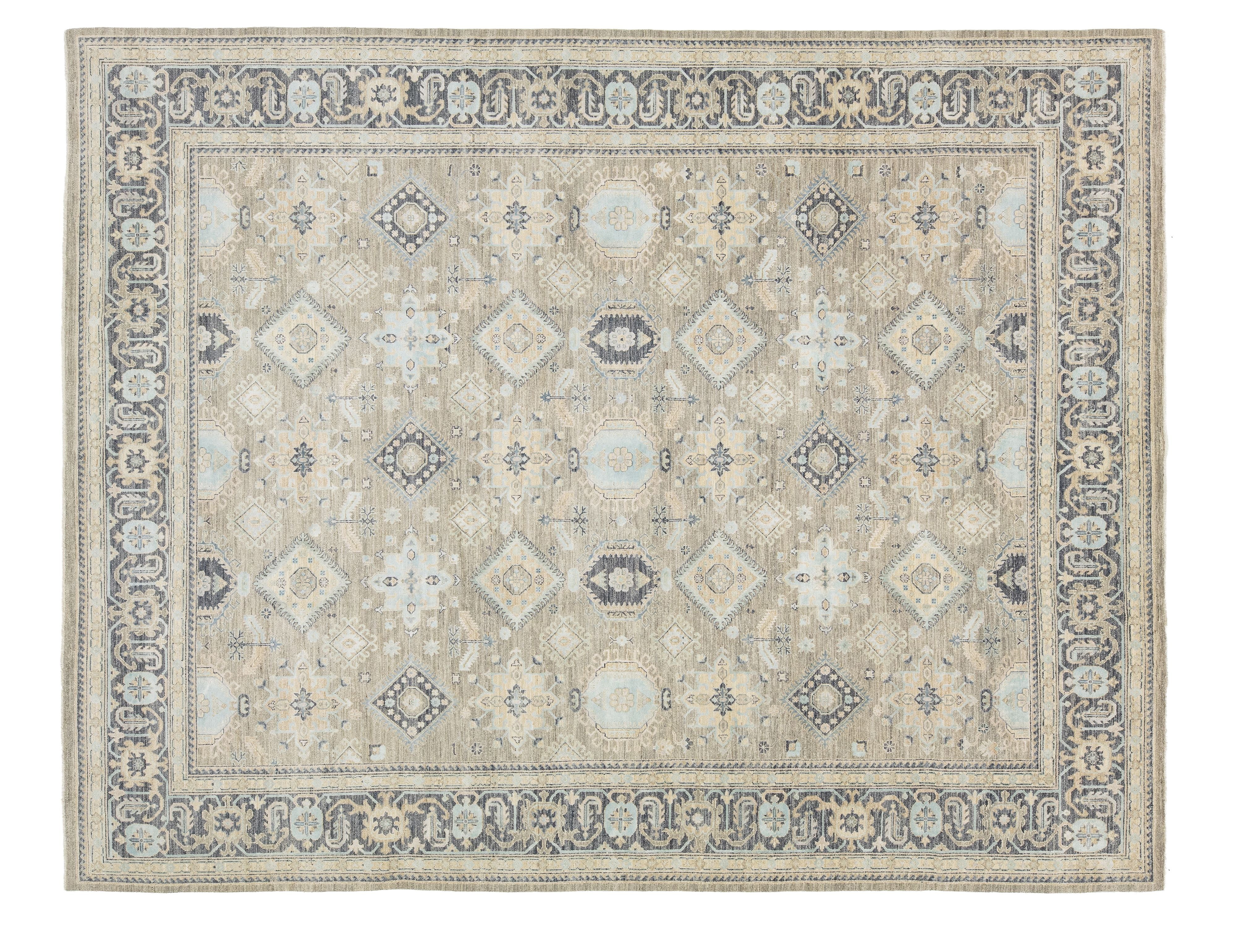 A traditional oriental-style area rug with a beige base, featuring a detailed border and central medallion pattern in muted blue, gray, and cream tones.