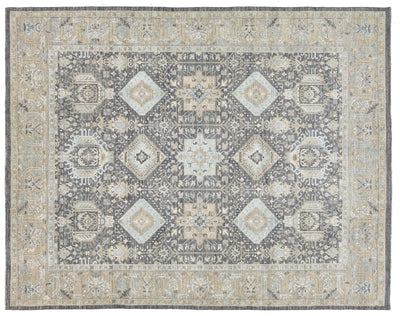 A rectangular area rug with a traditional medallion pattern in muted gray, beige, and light blue tones, shown flat against a white background.