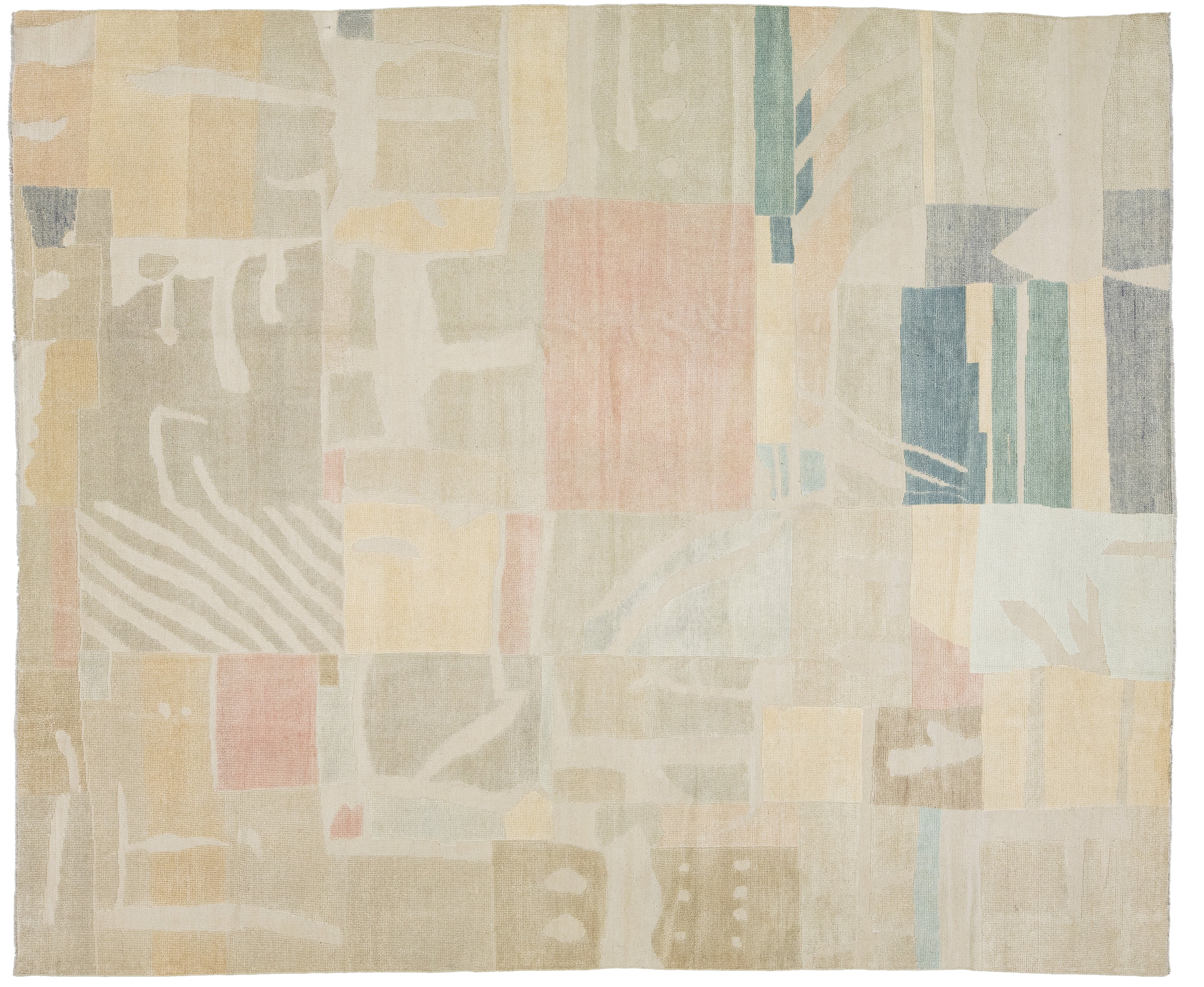 An abstract area rug with a geometric patchwork layout design in muted tones of beige, cream, dusty pink, sage green, and slate blue.