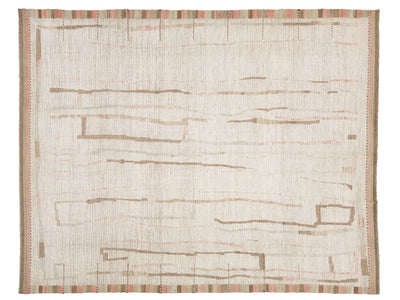 An abstract area rug with a textured cream and beige base, featuring vertical taupe lines and a striped border in muted terracotta and brown tones.