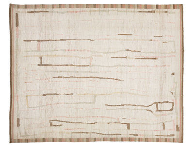 An abstract area rug with a textured cream base, featuring horizontal lines in brown, muted pink, and beige, finished with a striped border.