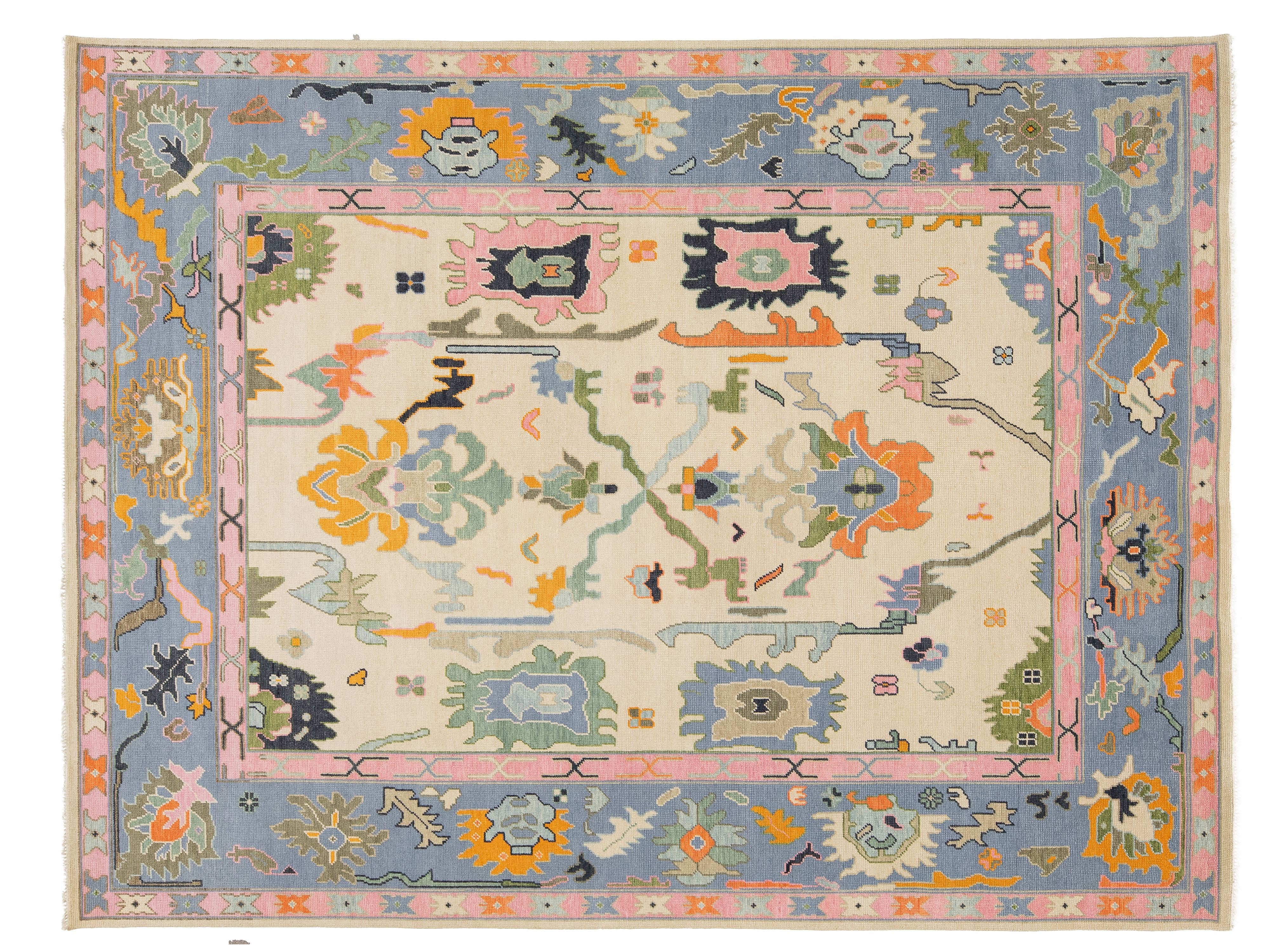 A rectangular area rug with a traditional Persian-style medallion design, featuring a cream center, a dusty blue border, and pink inner borders, accented with orange, green, and black motifs.