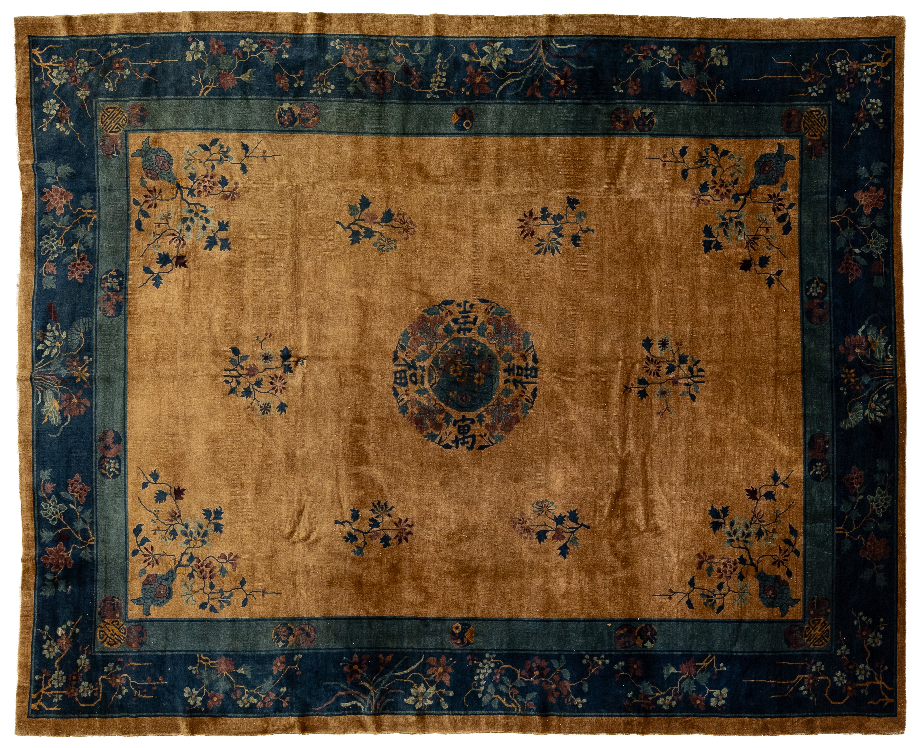 A traditional Chinese rug with a warm tan center field, a central medallion, and floral motifs, surrounded by a dark blue border.