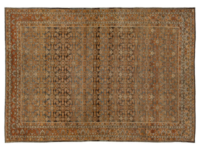 A rectangular traditional oriental Malayer rug with an intricate floral and geometric pattern in earthy tones of brown, rust, beige, and muted blue, shown flat against a white background.
