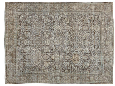A square vintage-style area rug with an intricate floral and medallion pattern in muted gray, beige, and brown tones, photographed flat against a white background.