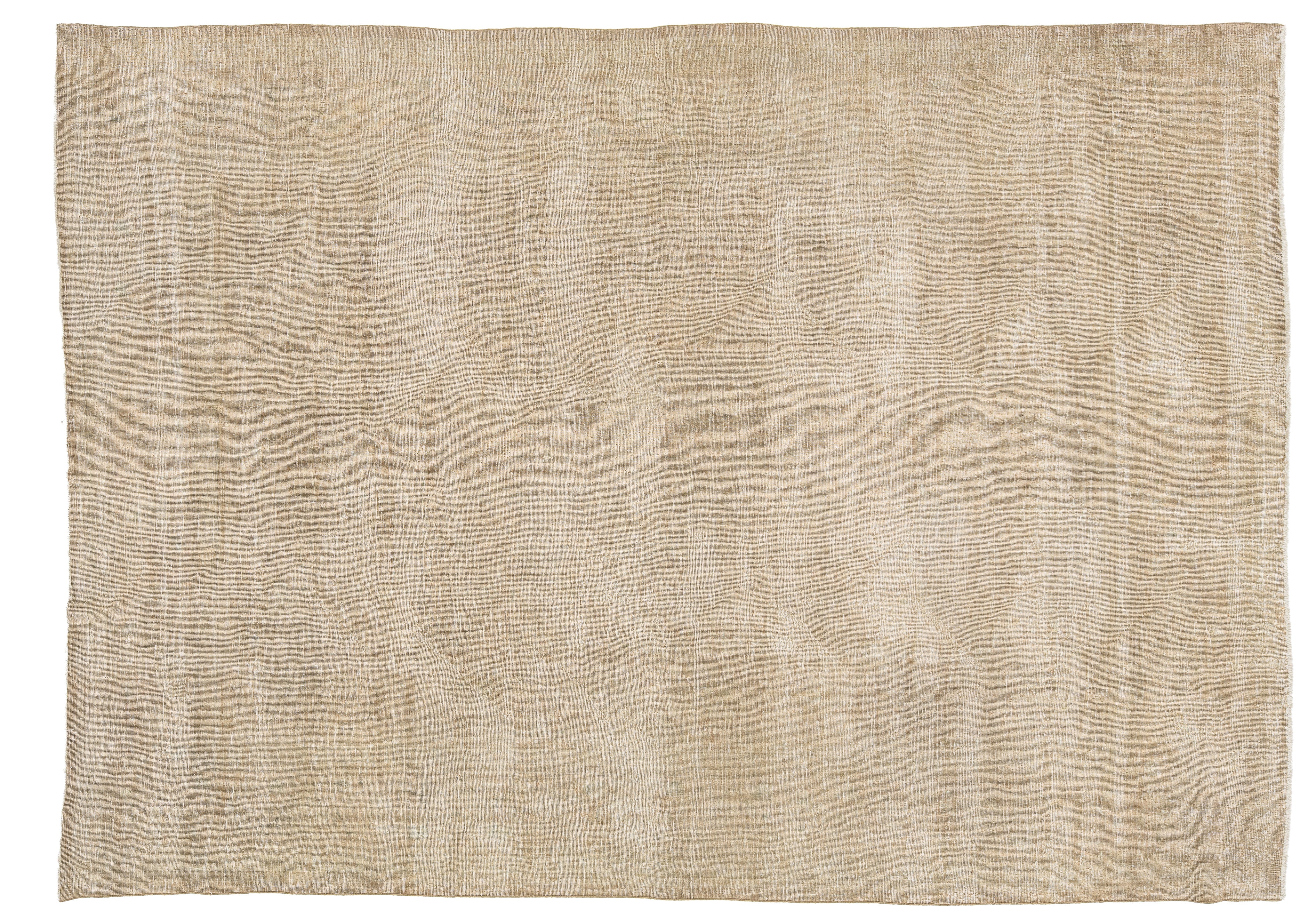 A rectangular area rug with a textured, distressed moiré wave pattern in a light beige and cream color palette, shown flat against a white background.
