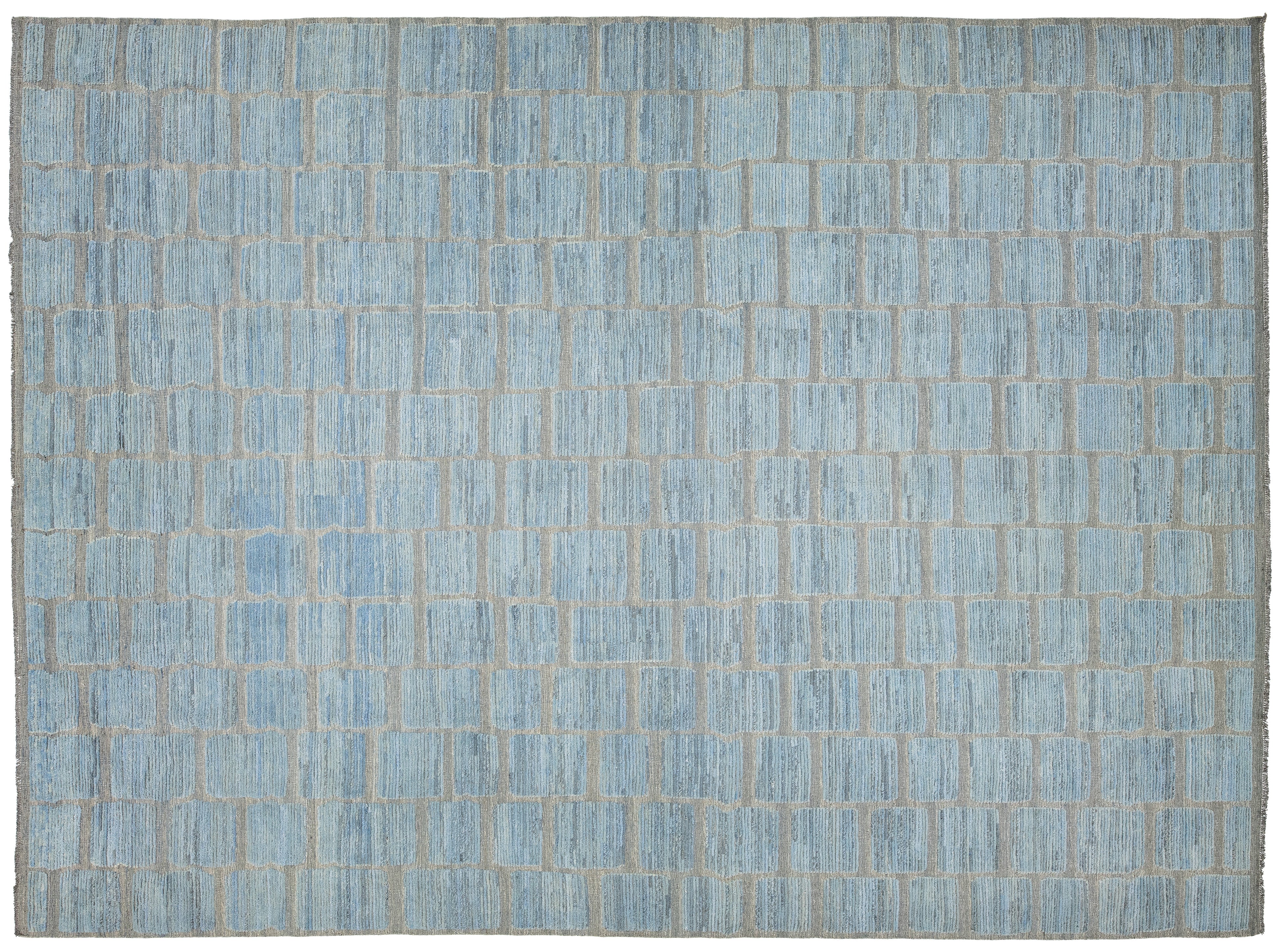 A rectangular area rug with a light blue and gray brick pattern, shown flat against a white background.
