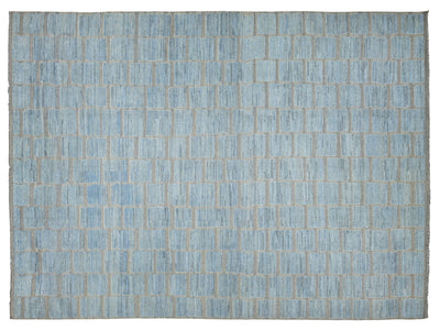 A rectangular area rug with a light blue and gray brick pattern, shown flat against a white background.