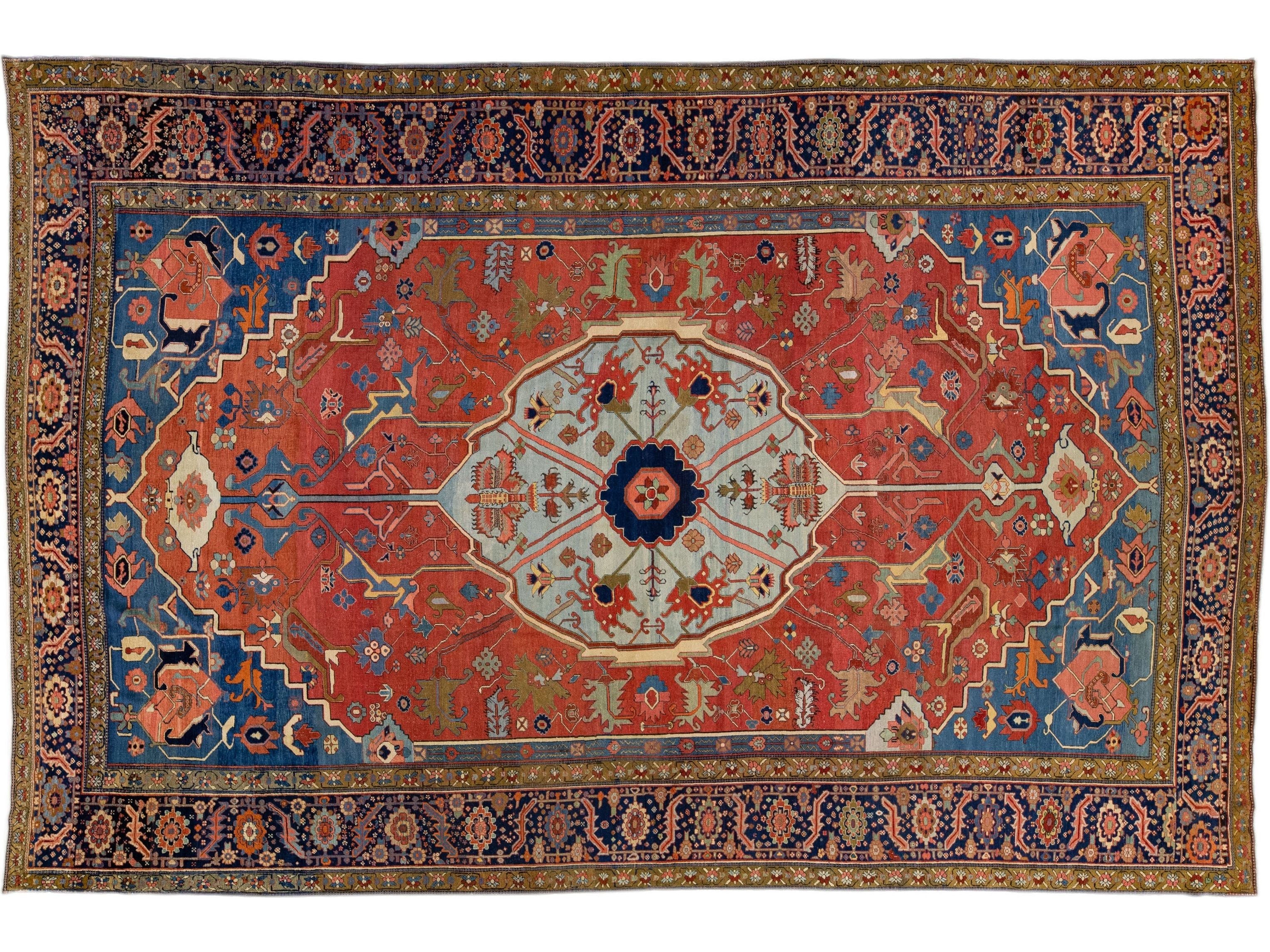 Antique Persian Serapi Red & Blue Handmade Wool Rug with Medallion Motif