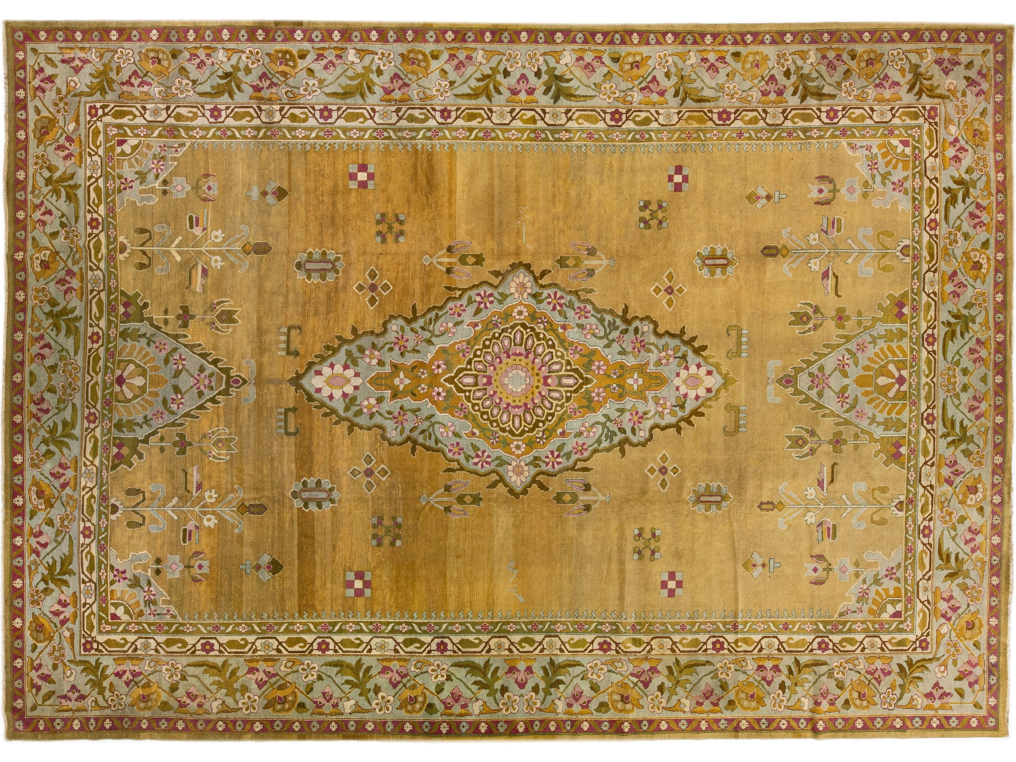 Antique Indian Agra Handmade Goldenrod Wool Rug With Medallion Design.