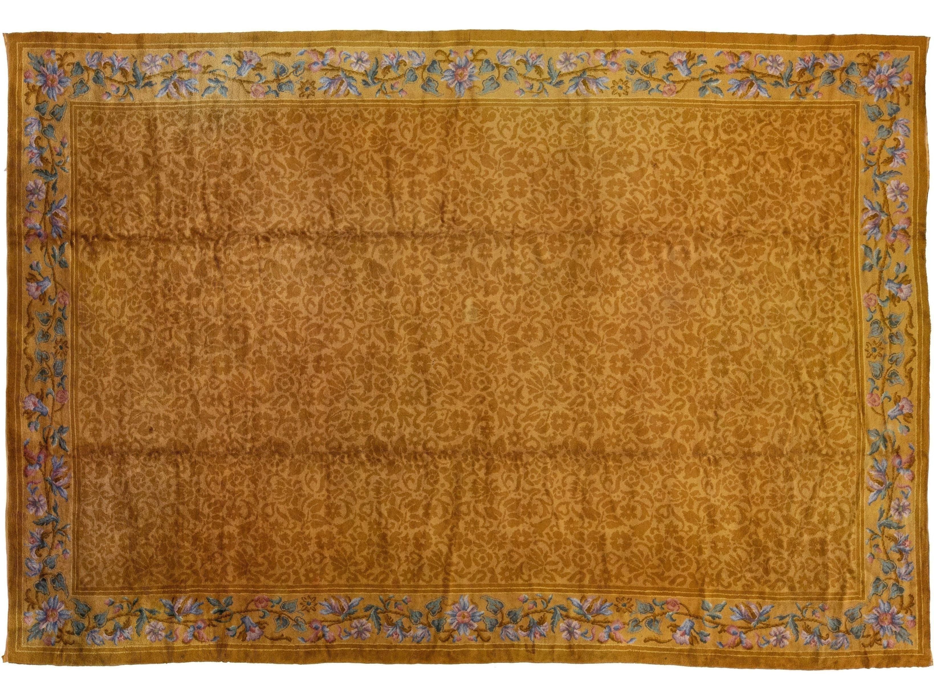 Antique Savonnerie Handmade Golderod Wool Rug with Allover Floral Motif