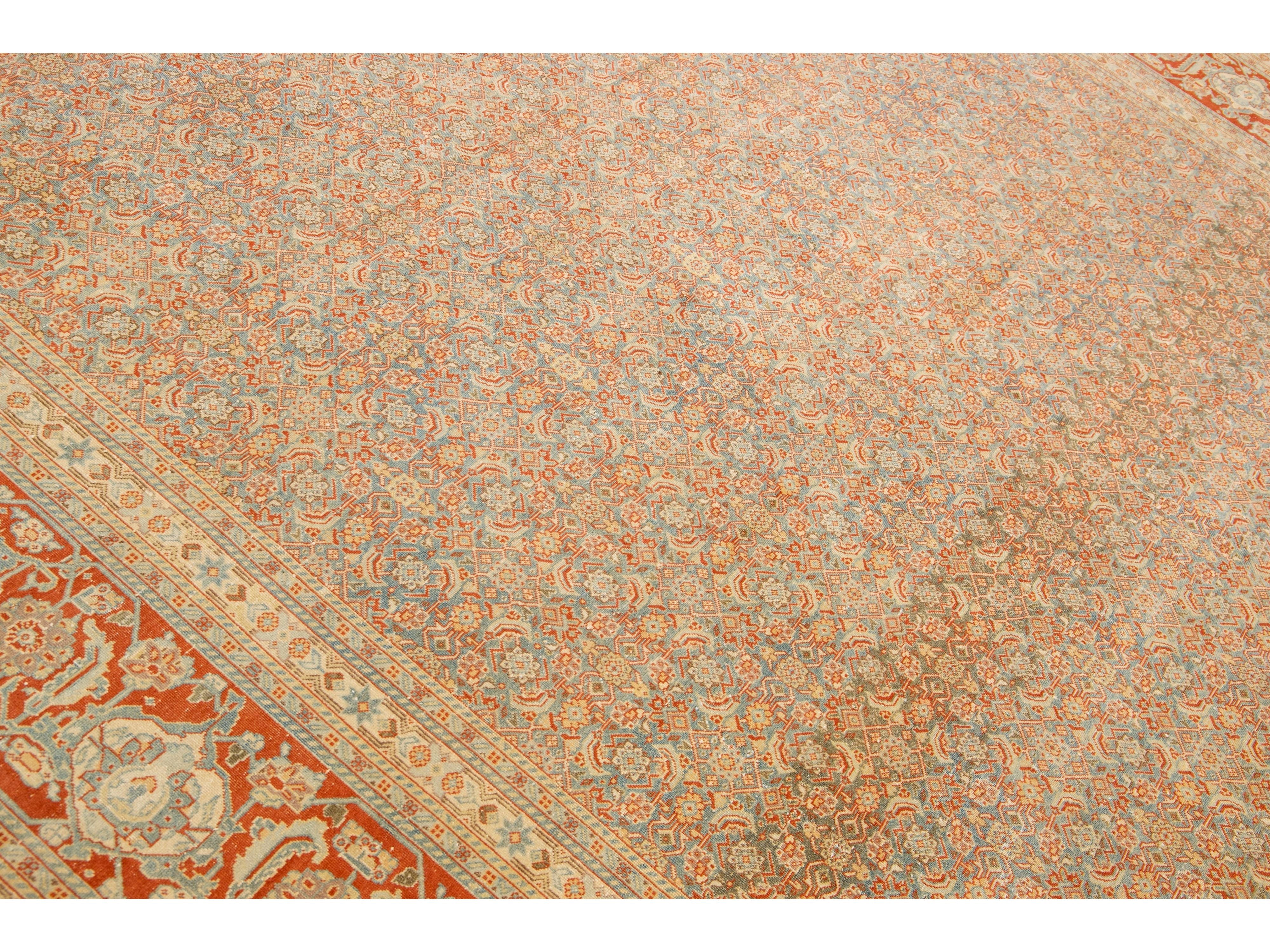 Antique Tabriz Handmade Allover Designed Blue And Rust Persian Wool Rug