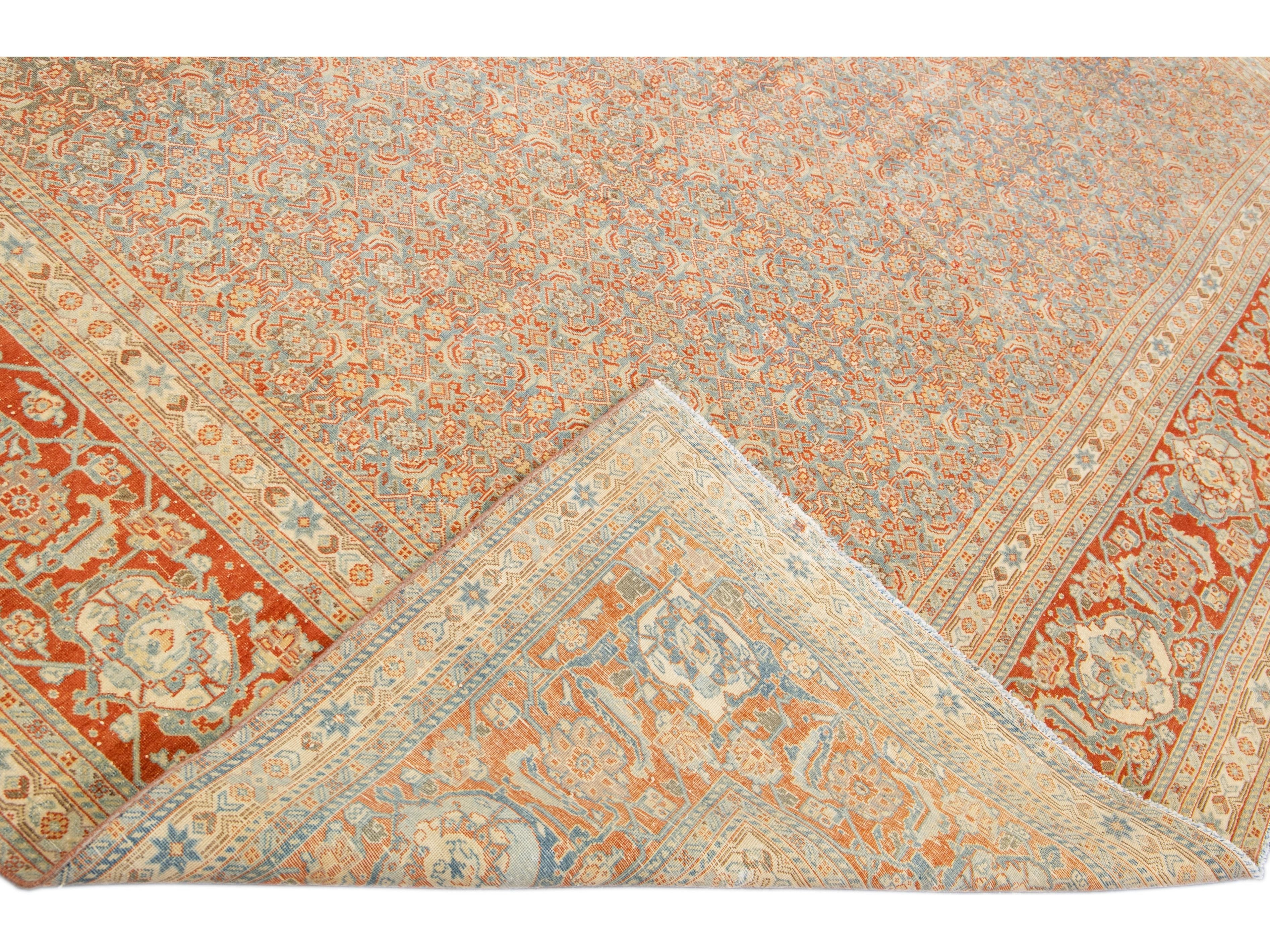 Antique Tabriz Handmade Allover Designed Blue And Rust Persian Wool Rug