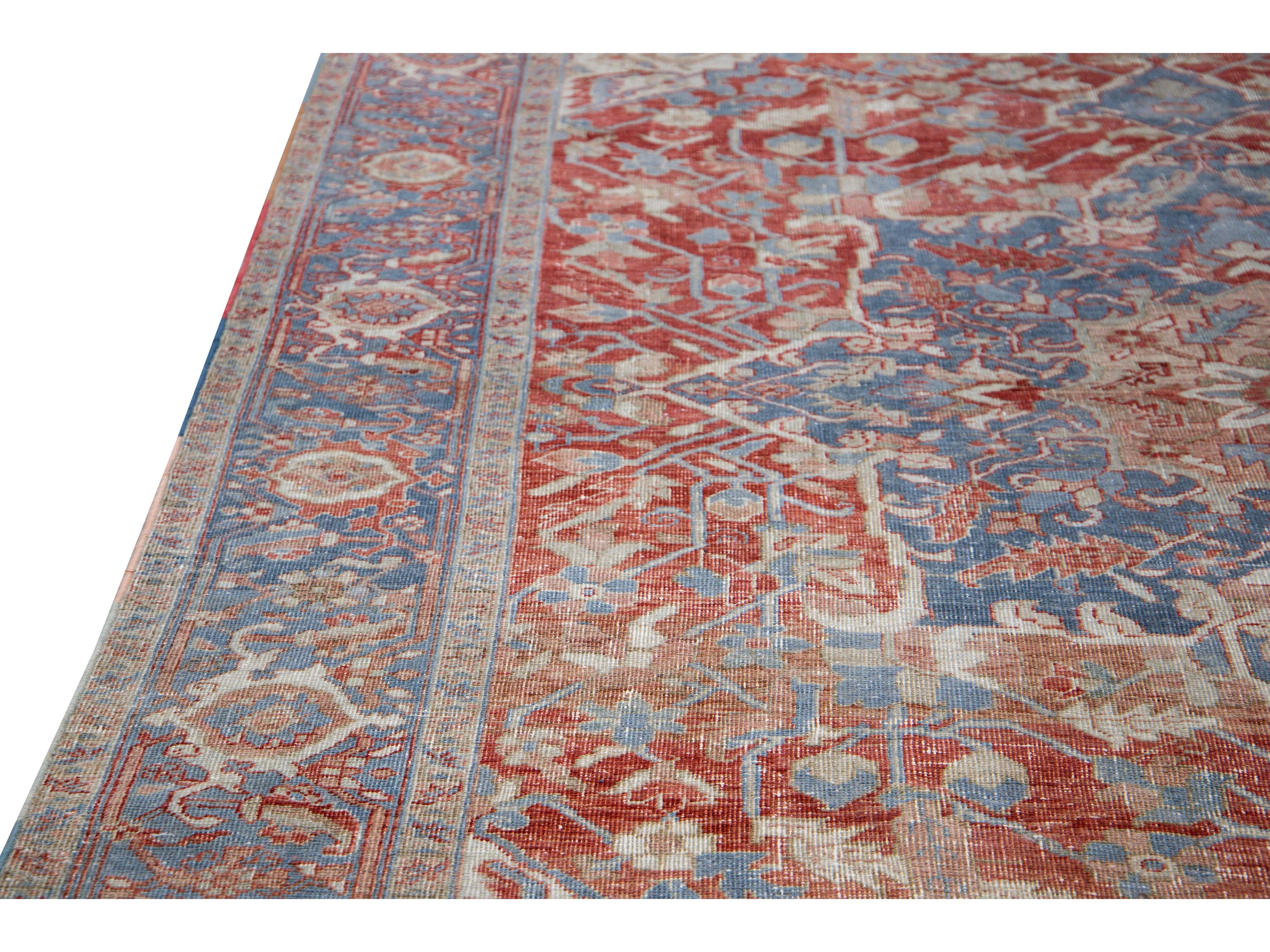 Antique Persian Heriz Handmade Red and Blue Medallion Floral Wool Rug