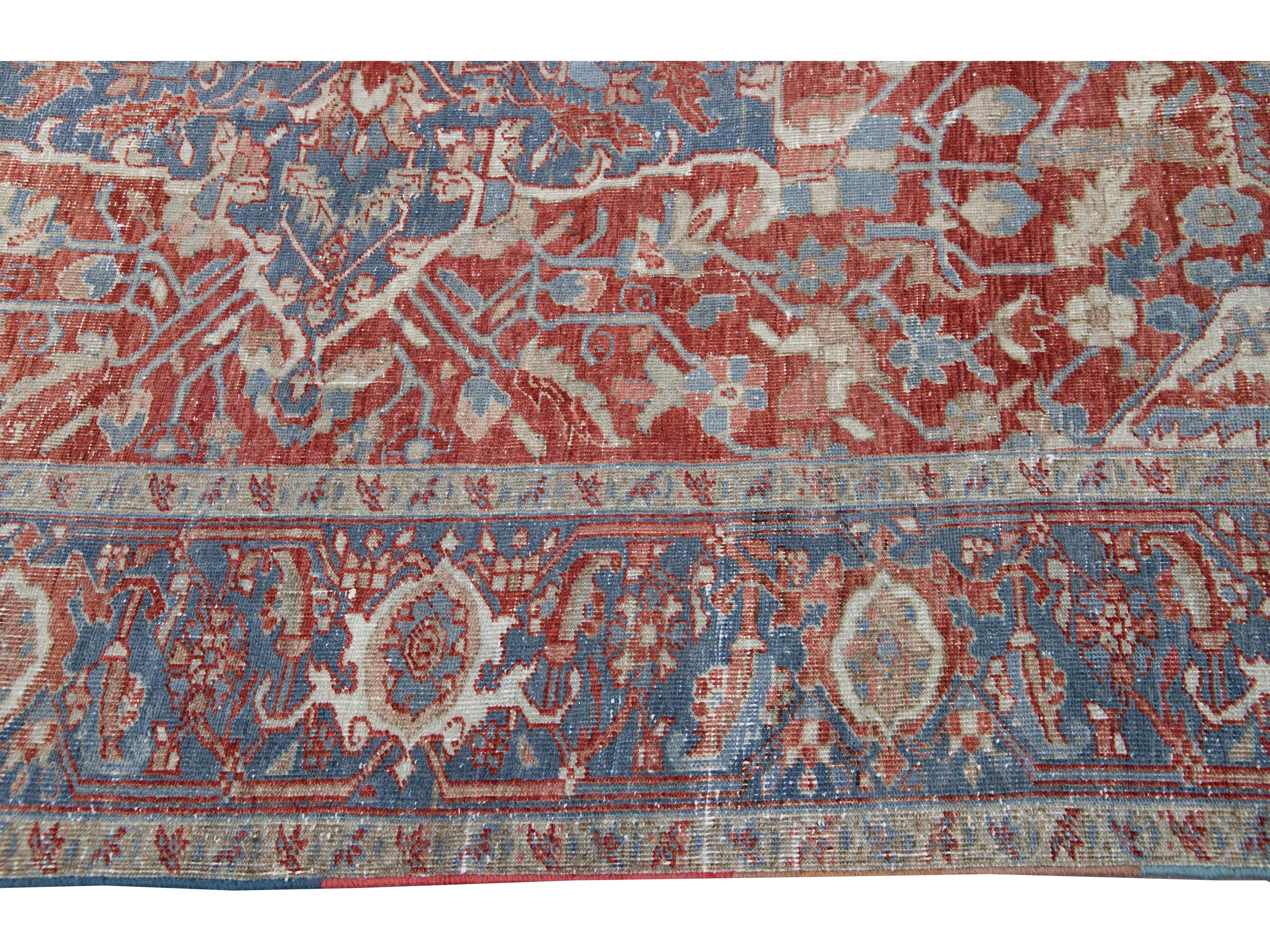 Antique Persian Heriz Handmade Red and Blue Medallion Floral Wool Rug